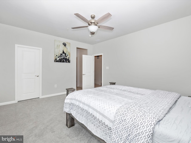 bedroom with baseboards, a ceiling fan, and carpet flooring