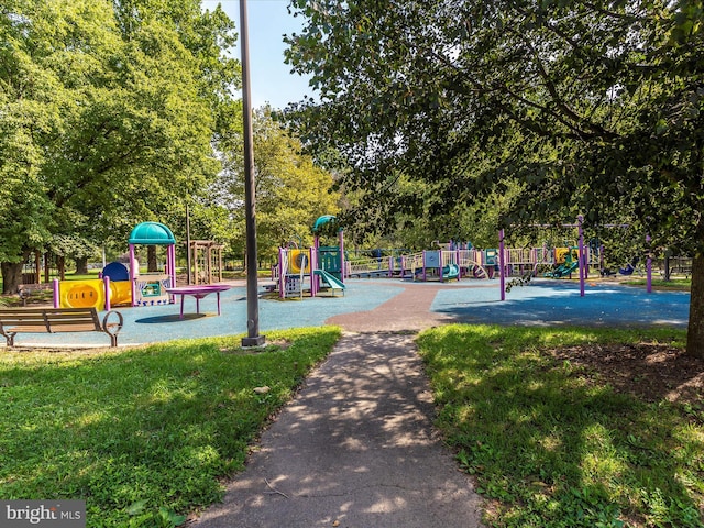 communal playground with a lawn