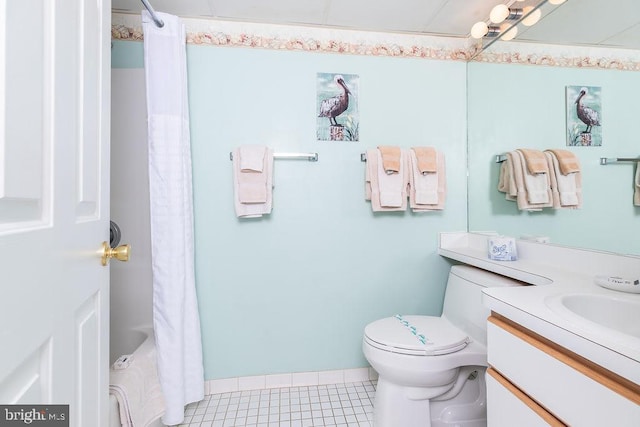 bathroom with baseboards, a shower with shower curtain, toilet, tile patterned floors, and vanity