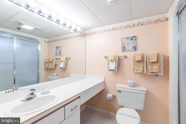 bathroom featuring visible vents, toilet, a shower stall, vanity, and tile patterned flooring