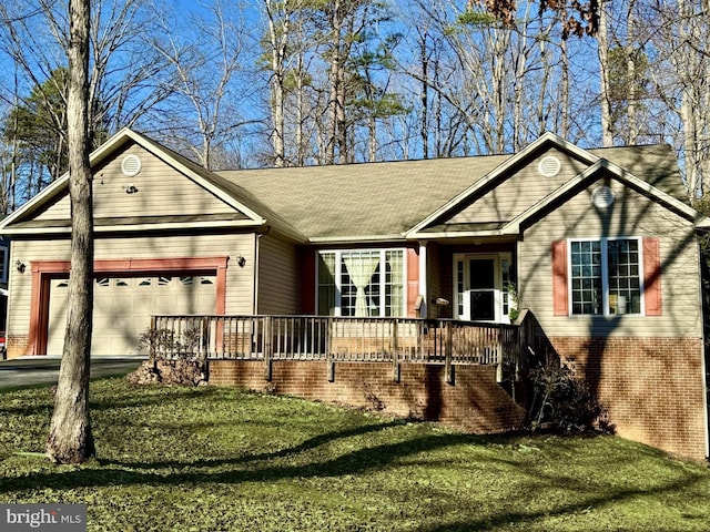 single story home with brick siding, covered porch, an attached garage, driveway, and a front lawn