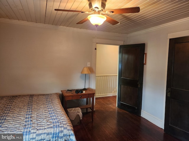 bedroom featuring wood finished floors, wood ceiling, baseboards, a ceiling fan, and ornamental molding