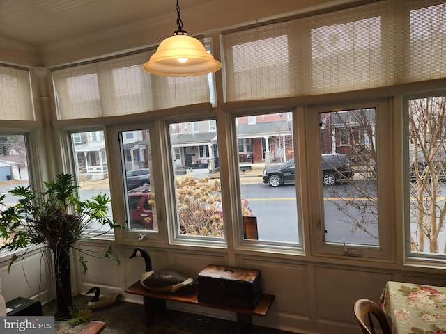 sunroom featuring a healthy amount of sunlight