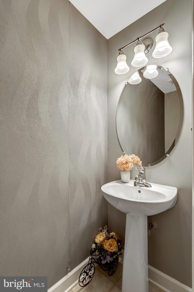 bathroom with tile patterned floors