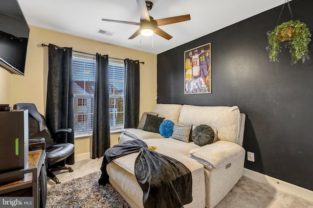 bedroom with visible vents, baseboards, carpet, and a ceiling fan