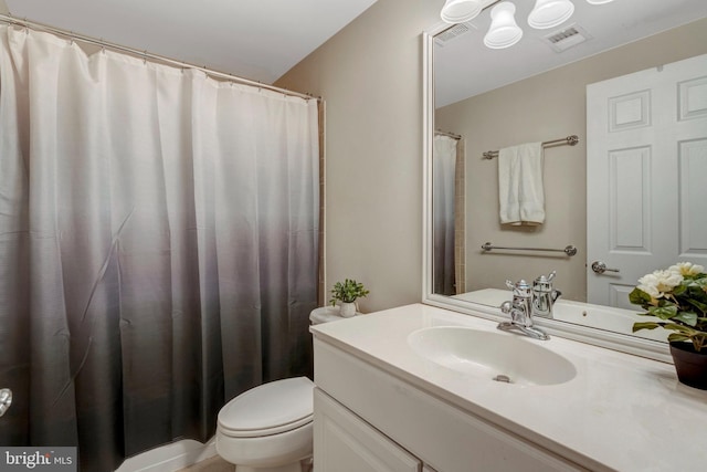 full bath with visible vents, toilet, and vanity