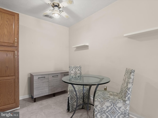 dining area featuring visible vents, baseboards, and a ceiling fan