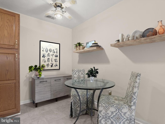 dining area featuring visible vents, baseboards, and a ceiling fan