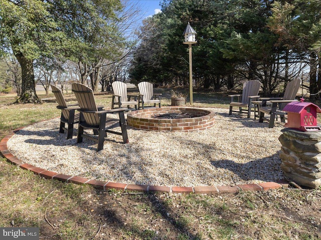 view of patio / terrace featuring a fire pit