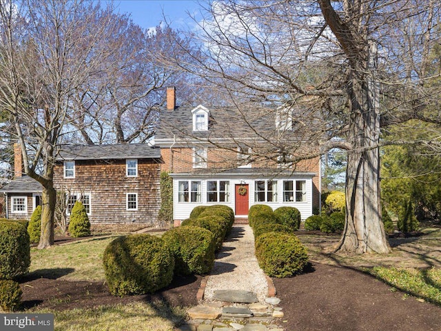 view of front of house with a chimney