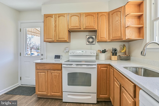 kitchen featuring white appliances, baseboards, open shelves, a sink, and dark wood-type flooring