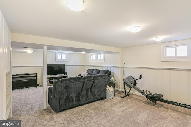 living room with wainscoting and carpet