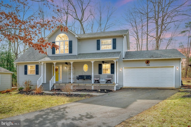 view of front facade with aphalt driveway, a porch, crawl space, ceiling fan, and a garage