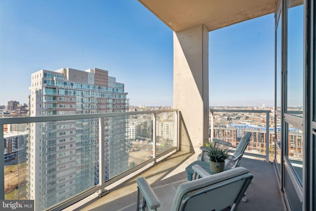 balcony featuring a view of city