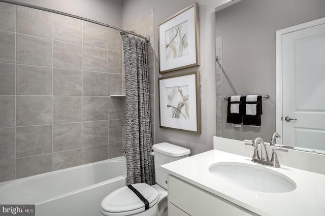 bathroom featuring shower / tub combo, vanity, and toilet