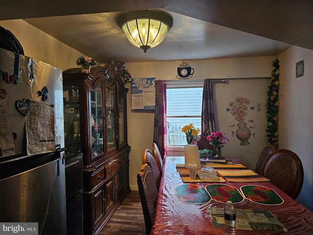 dining room with dark wood-type flooring