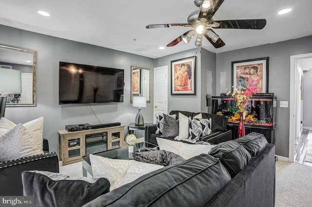 living room with recessed lighting, a ceiling fan, baseboards, and carpet floors