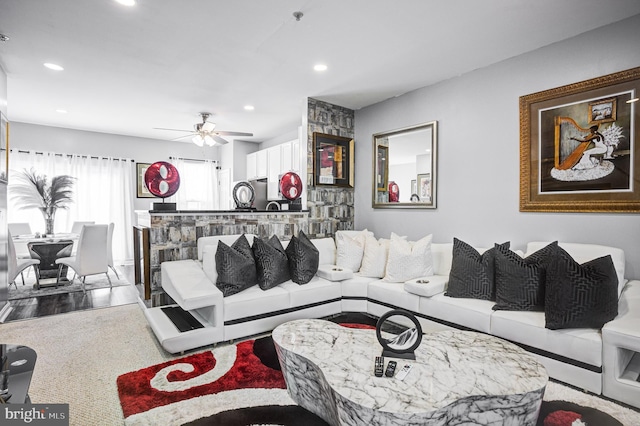 living room with recessed lighting and ceiling fan