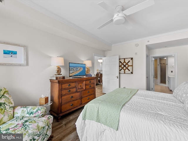 bedroom featuring ornamental molding, ceiling fan, and wood finished floors