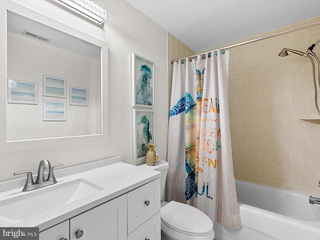 bathroom with toilet, shower / tub combo, visible vents, and vanity