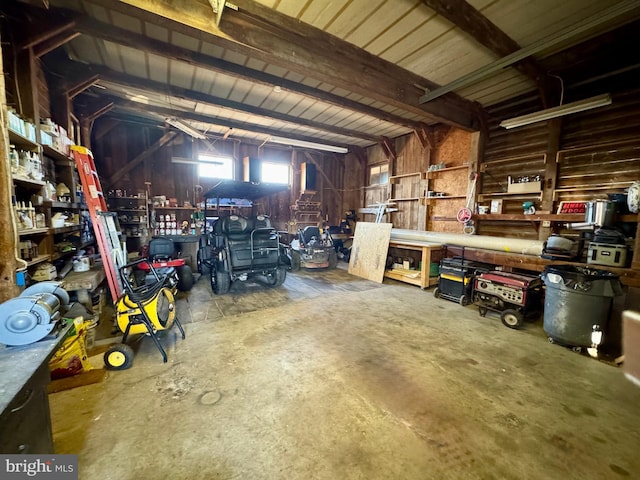 garage with a workshop area