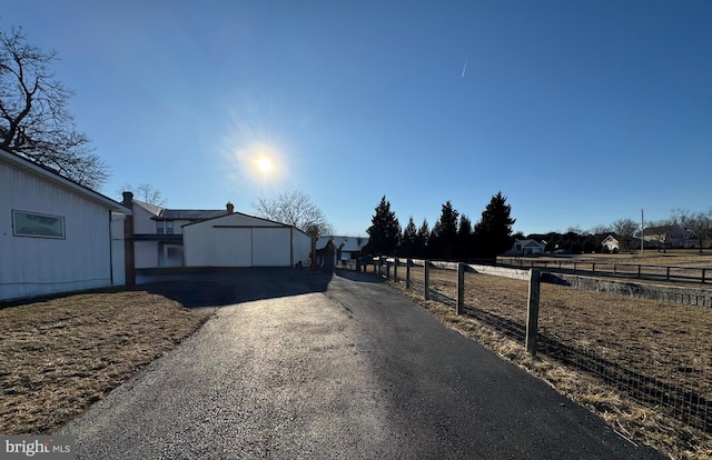 view of road with driveway