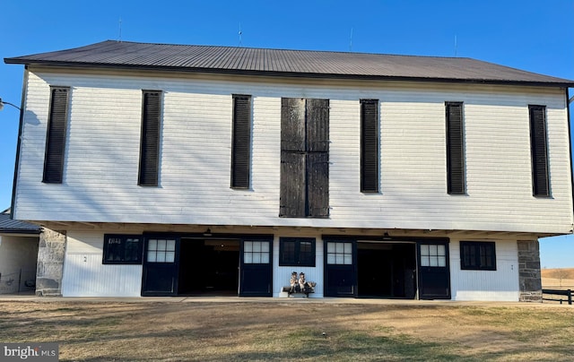 view of front of home featuring metal roof