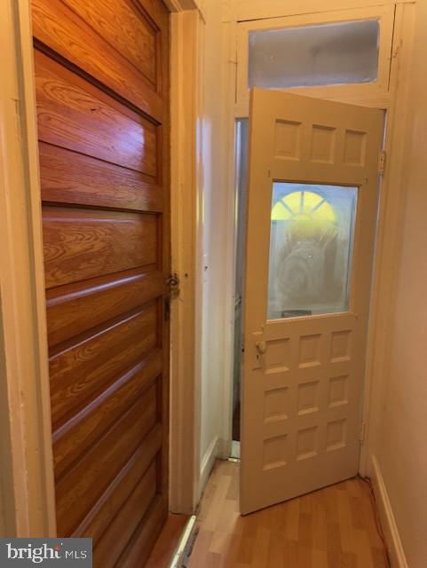 doorway to outside featuring light wood-style flooring