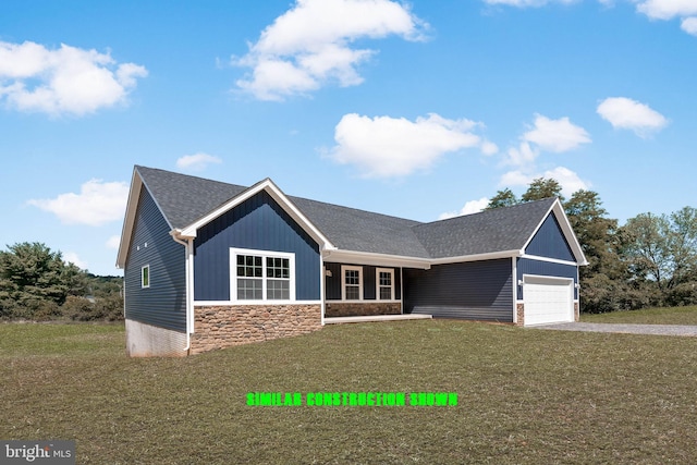 view of front facade featuring stone siding, roof with shingles, gravel driveway, a front yard, and a garage