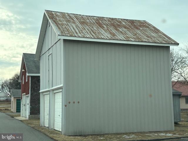 view of outbuilding featuring a garage