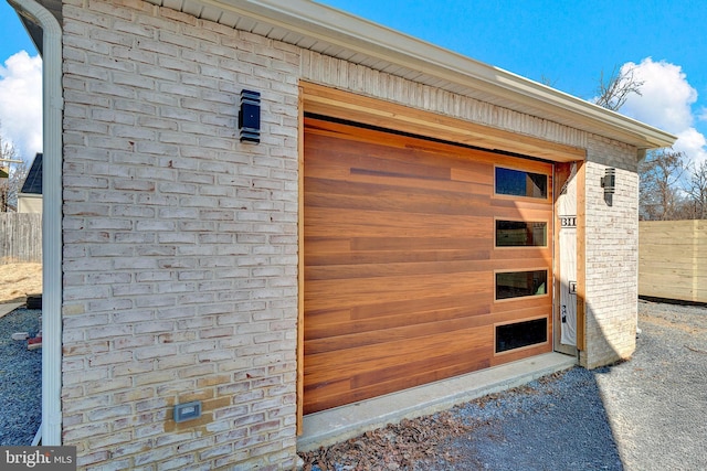 exterior space with fence and an outdoor structure