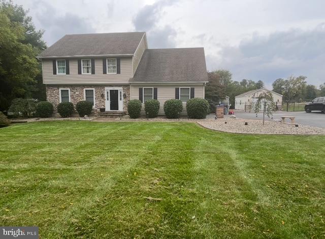 colonial house with a front yard