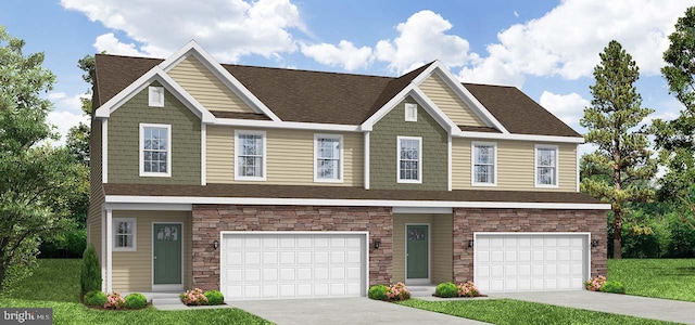 view of front of house featuring a garage, stone siding, a front yard, and driveway