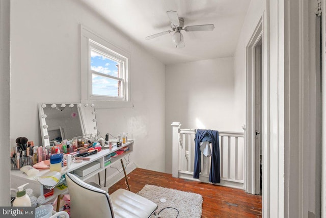 home office with ceiling fan and wood finished floors