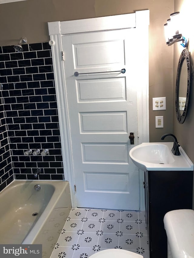 full bath with toilet, tub / shower combination, and vanity