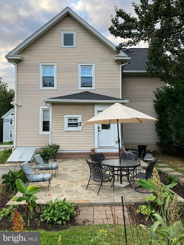 rear view of house with a patio area