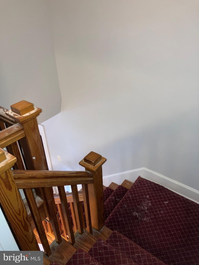 staircase with baseboards