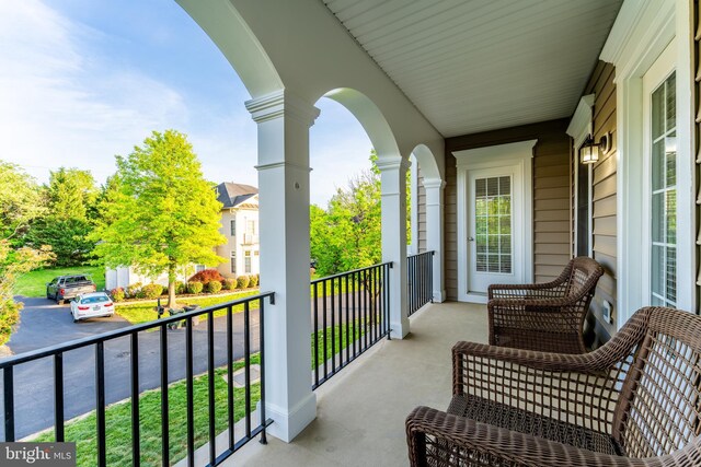 balcony featuring a porch