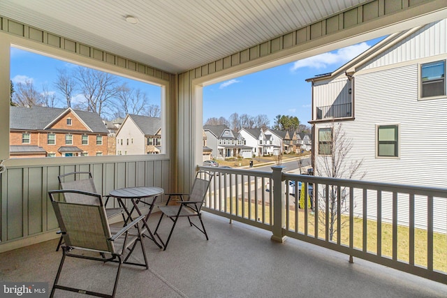 balcony featuring a residential view