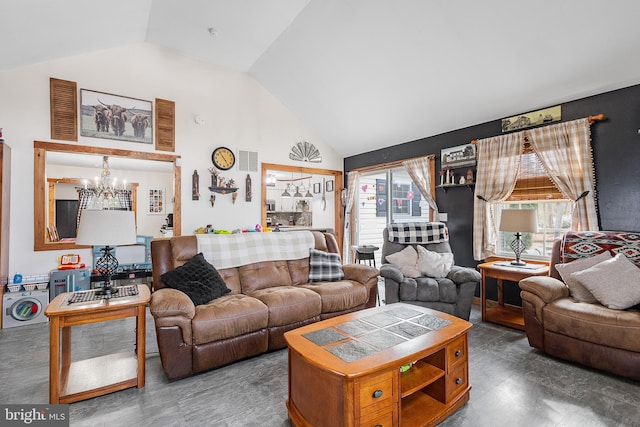 living area with high vaulted ceiling, visible vents, and a notable chandelier