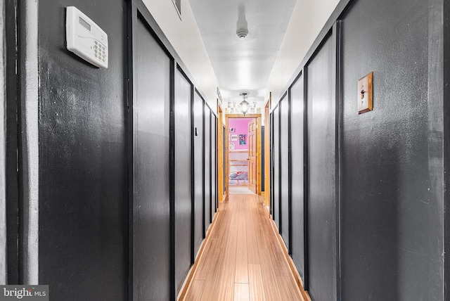 corridor featuring light wood-type flooring