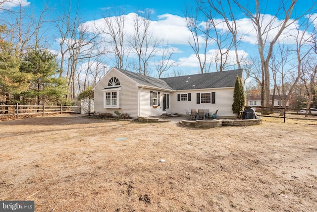 single story home featuring a fenced backyard and a patio