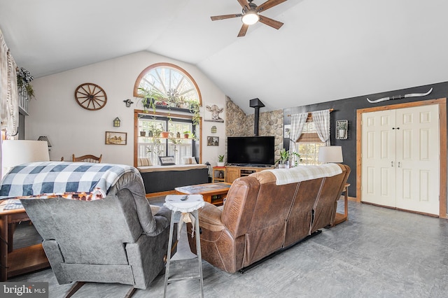 living room featuring lofted ceiling and ceiling fan