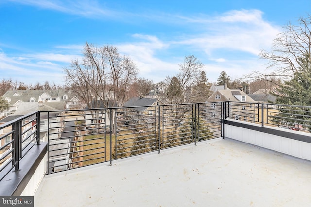 balcony featuring a residential view