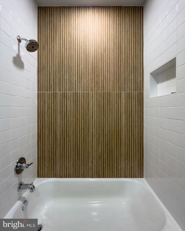 bathroom featuring bathing tub / shower combination