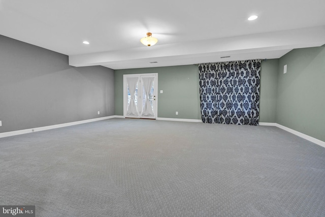 carpeted empty room with recessed lighting and baseboards