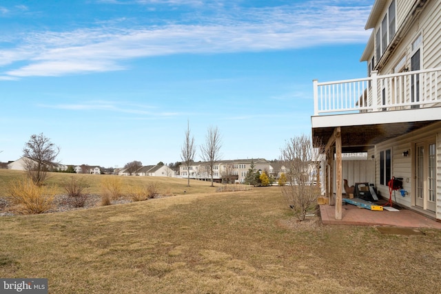 view of yard featuring a wooden deck