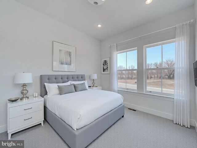 bedroom with recessed lighting, visible vents, baseboards, and light colored carpet