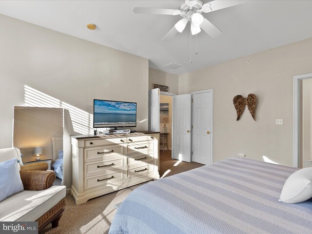 bedroom featuring a ceiling fan and carpet flooring