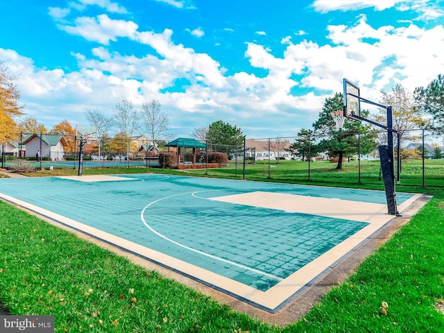 view of basketball court featuring a gazebo, community basketball court, a yard, and fence